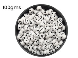 Cuentas plasticas pastilla blanca vocales negra 